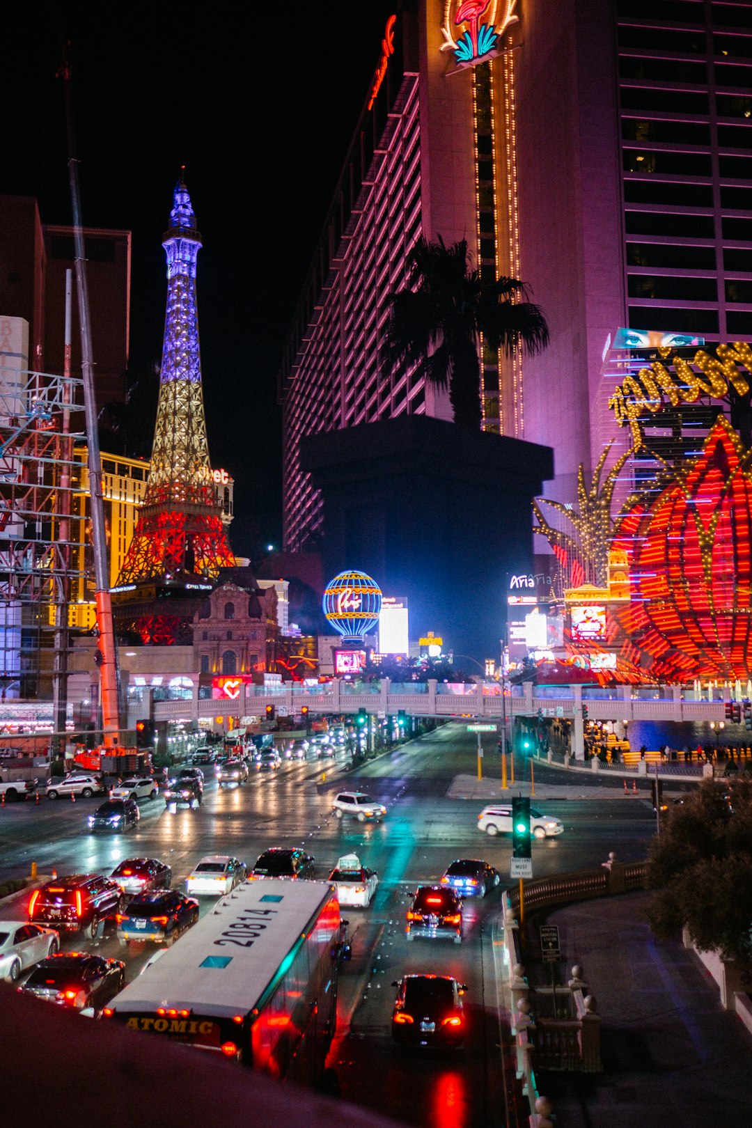 The bridges over the Las Vegas Strip are lined with plexiglass. Shooting through the glass made for an interesting composite image. The Flamingo Hotel and silhouette palm tree were in fact behind me me when I took this photo.